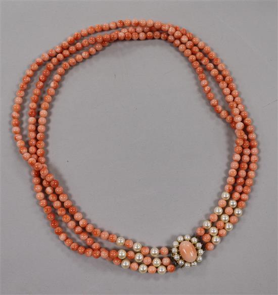 A triple strand coral and cultured pearl bead necklace with 9ct gold clasp, 46cm.